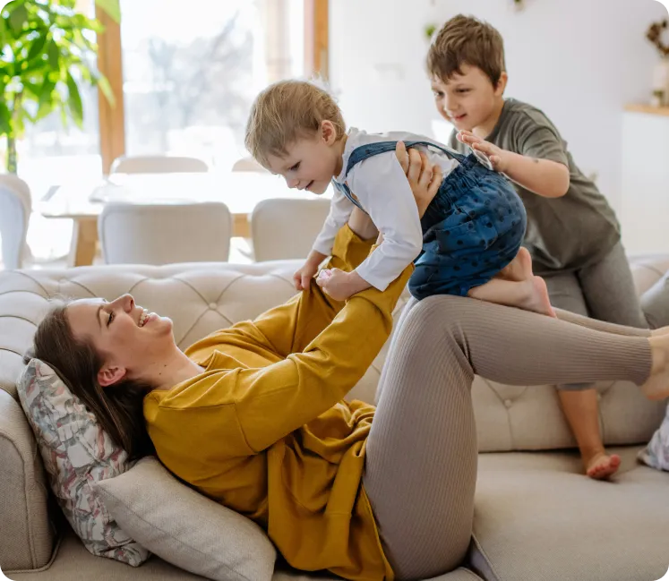 Mother playing with children